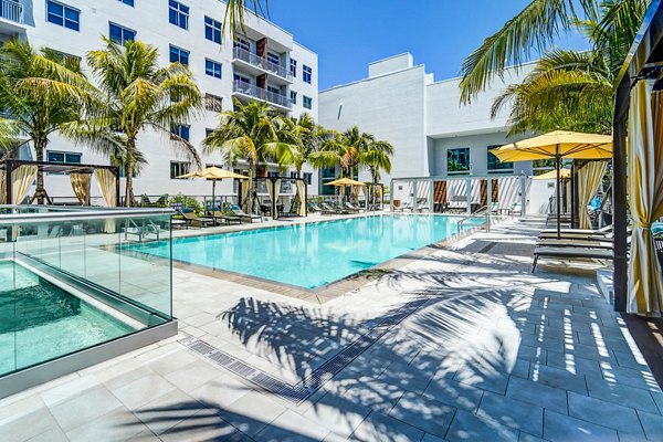 Stylish pool at Oversea at Flagler Banyan Square Apartments offering luxury relaxation in a vibrant community