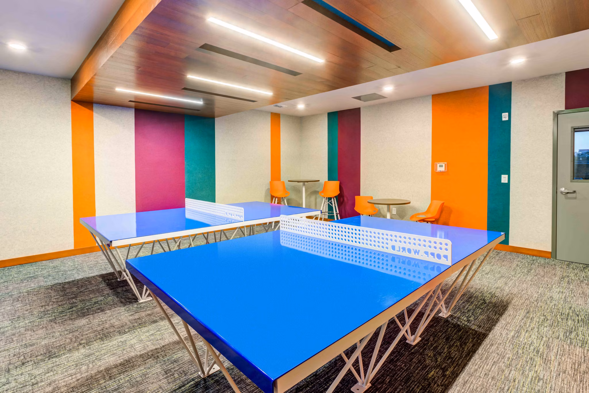 Game room featuring pool table and arcade games at Union on Fletcher Apartments