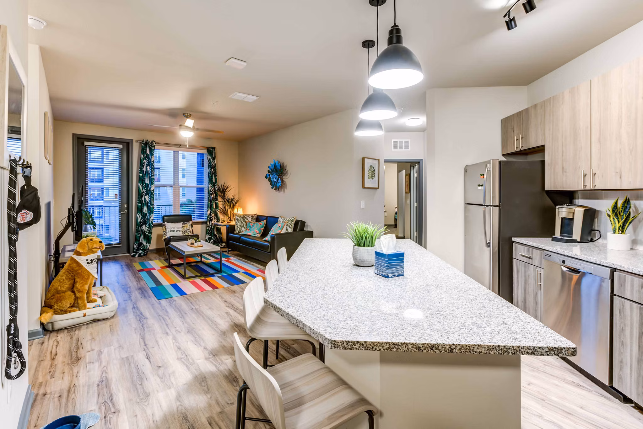 Modern kitchen with stainless steel appliances at Union on Fletcher Apartments