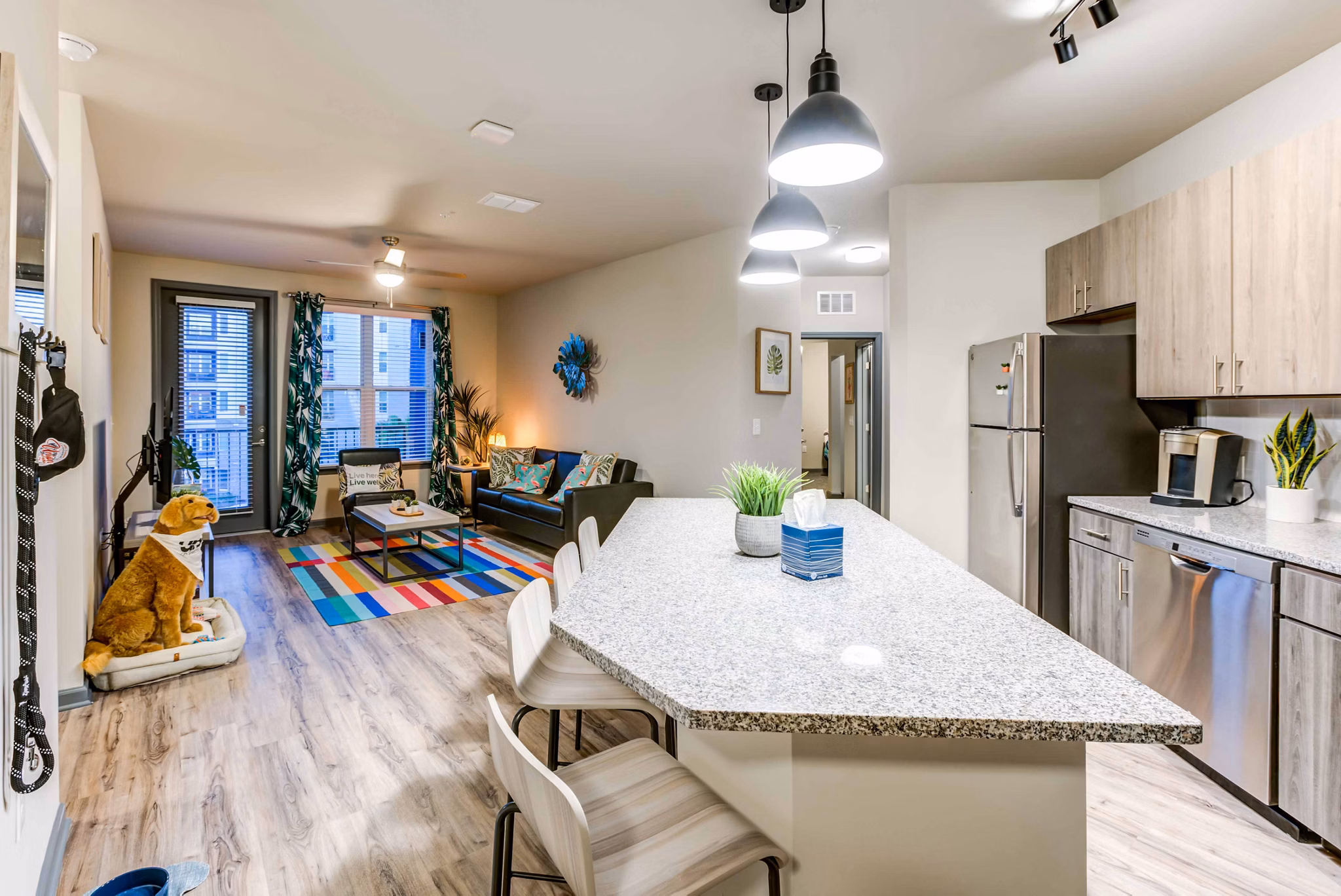Modern kitchen with stainless steel appliances at Union on Fletcher Apartments