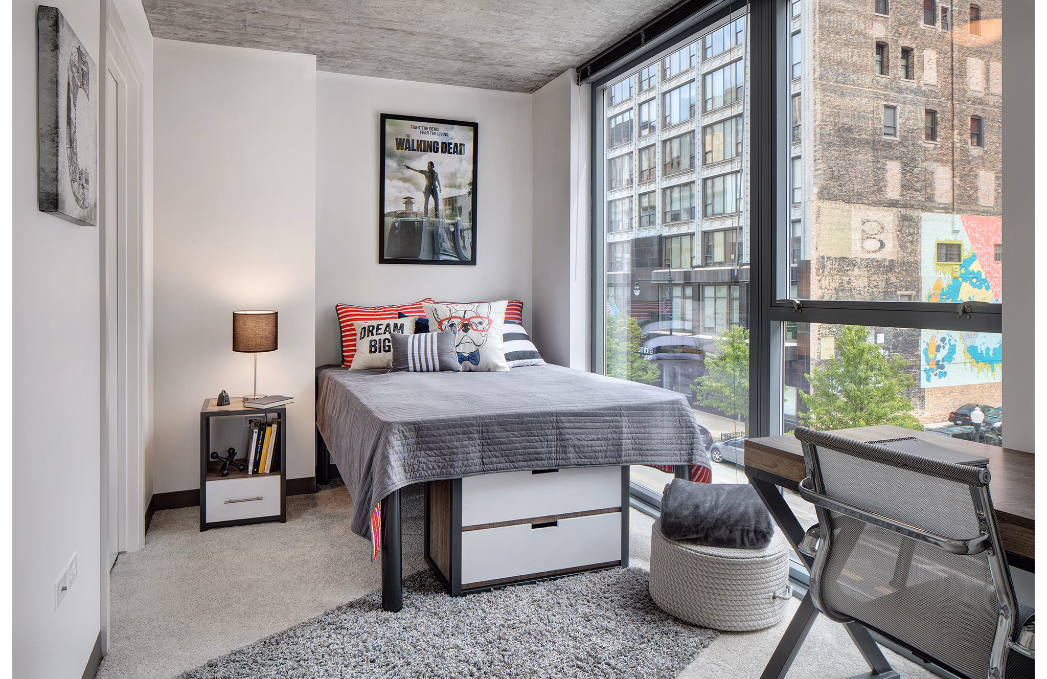 Modern bedroom with large windows and stylish decor in Greystar luxury apartments