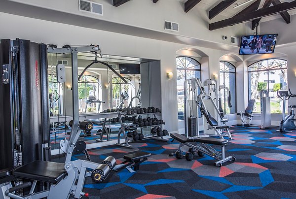 fitness center at San Valiente Apartments