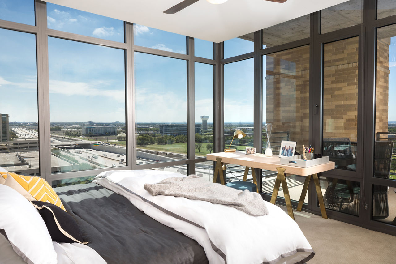 Luxurious bedroom featuring designer decor and ample space at The Kincaid at Legacy Apartments