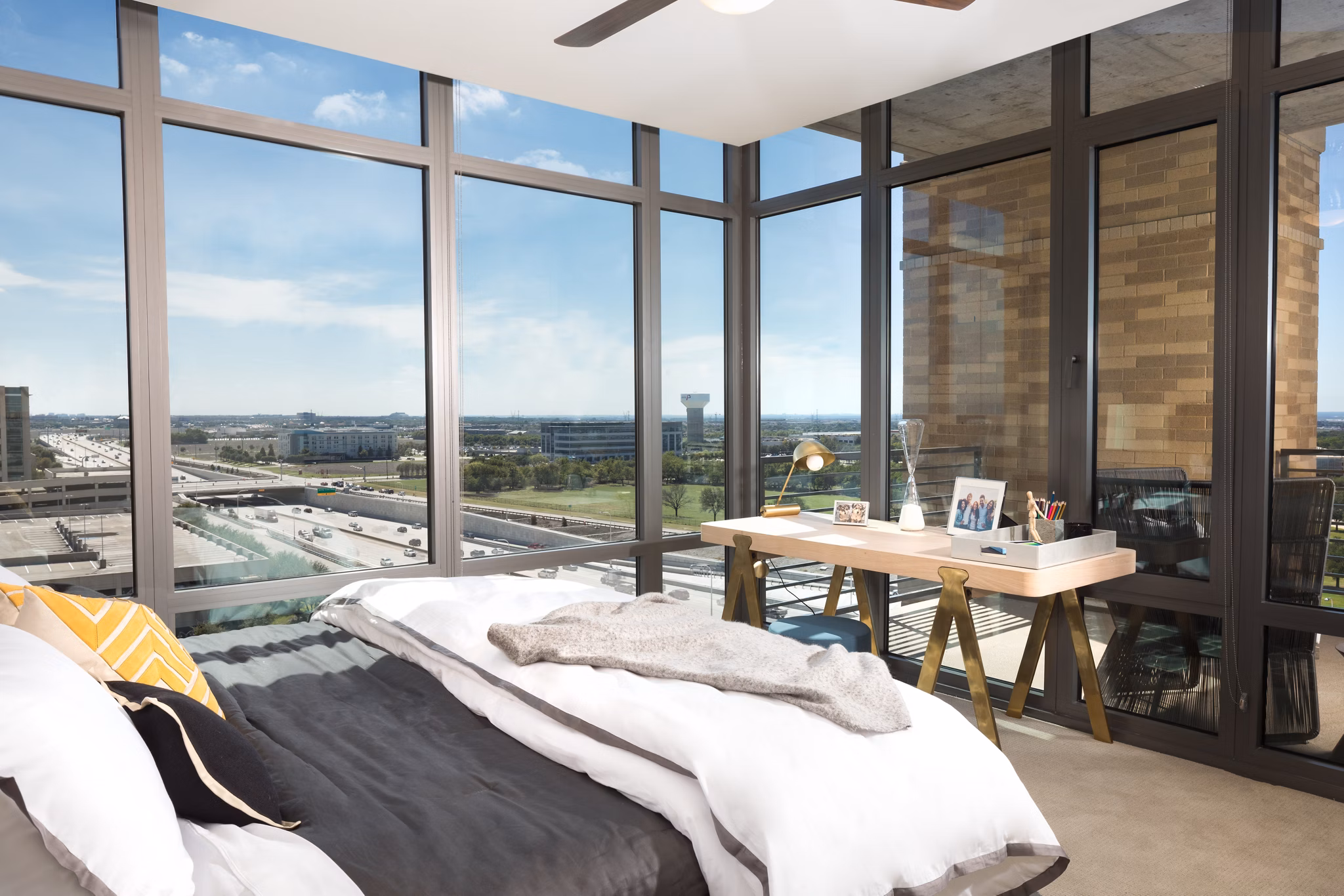 Luxurious bedroom featuring designer decor and ample space at The Kincaid at Legacy Apartments