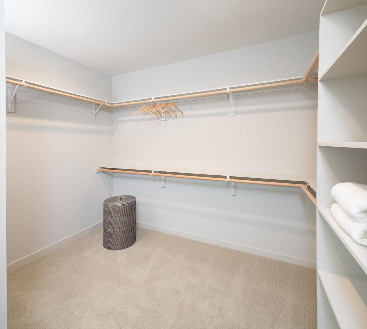 Spacious walk-in closet with ample storage in The Kincaid at Legacy Apartments