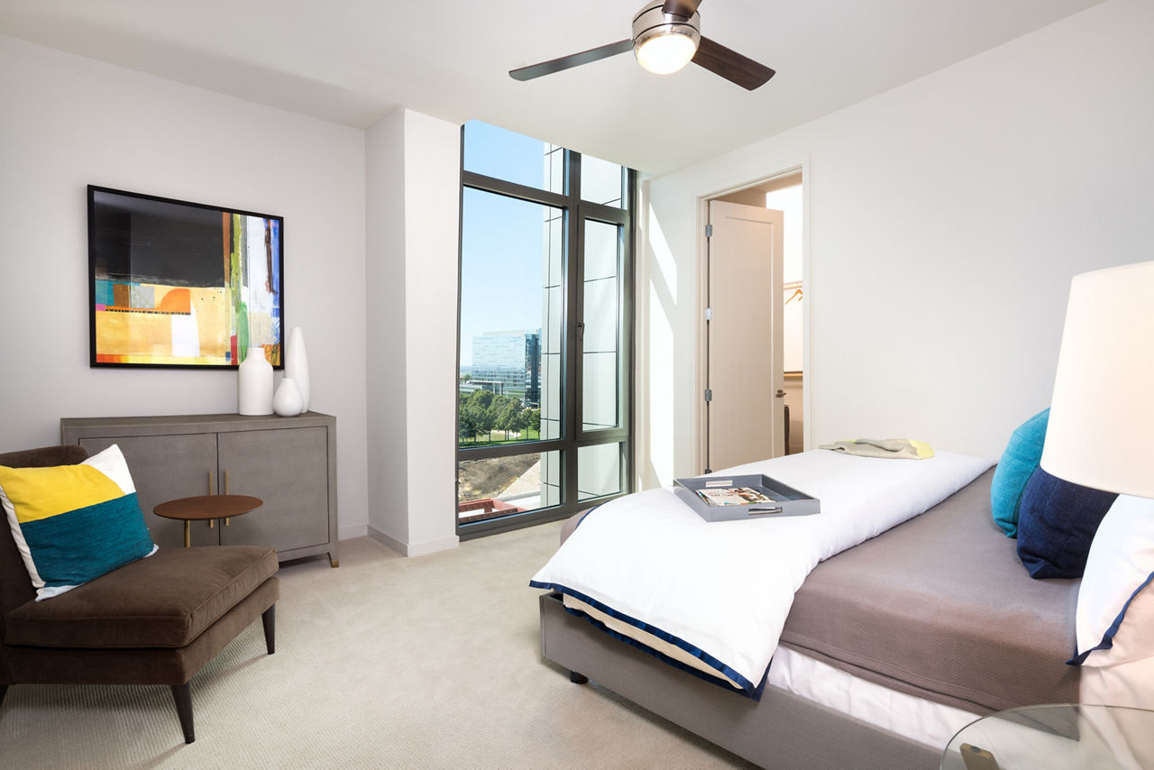 Elegant bedroom with modern decor at The Kincaid at Legacy Apartments