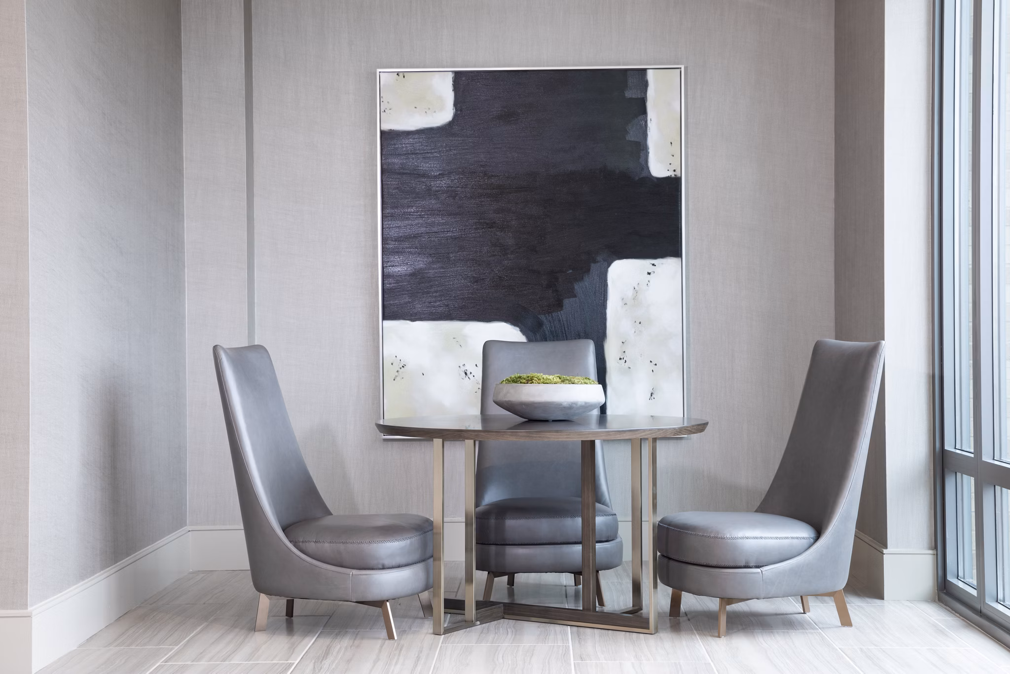 Clubhouse featuring modern design and elegant seating at The Kincaid at Legacy Apartments