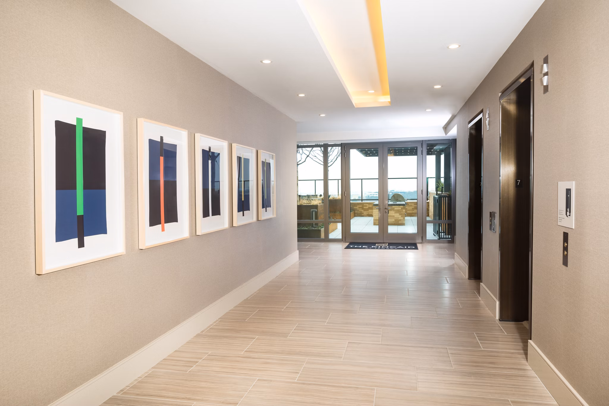 Clubhouse with modern design and seating areas at The Kincaid at Legacy Apartments
