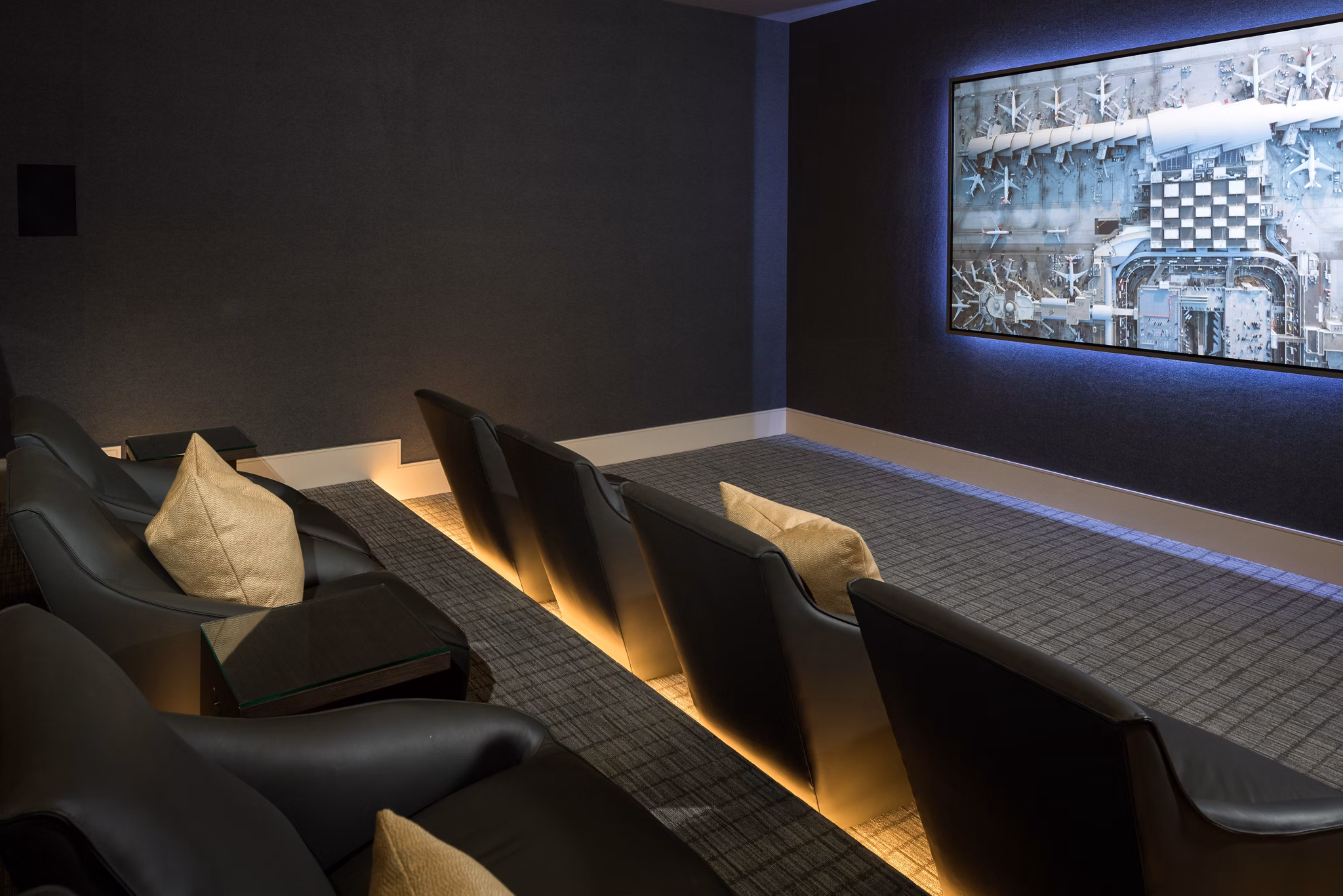 Luxury theater with plush seating in The Kincaid at Legacy Apartments