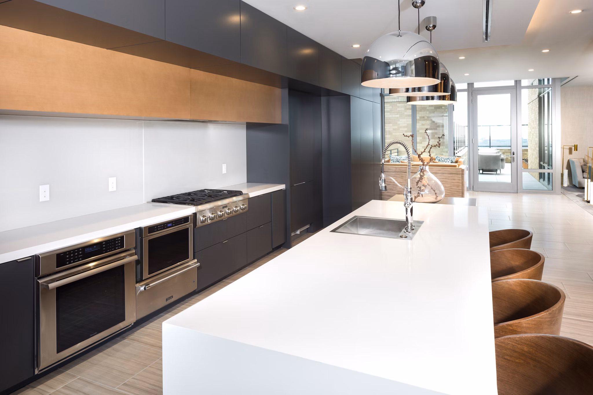 Clubhouse featuring modern design and comfortable seating at The Kincaid at Legacy Apartments