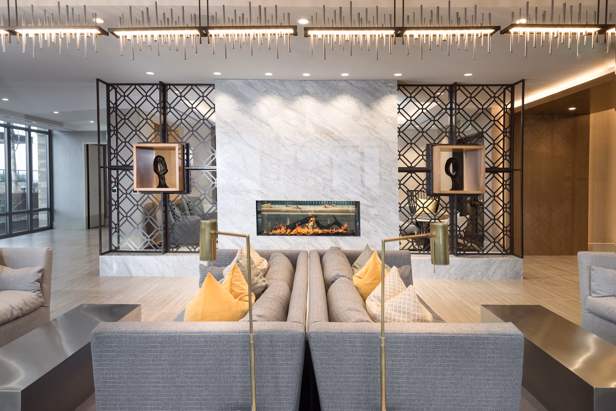 Clubhouse with modern seating and entertainment options at The Kincaid at Legacy Apartments