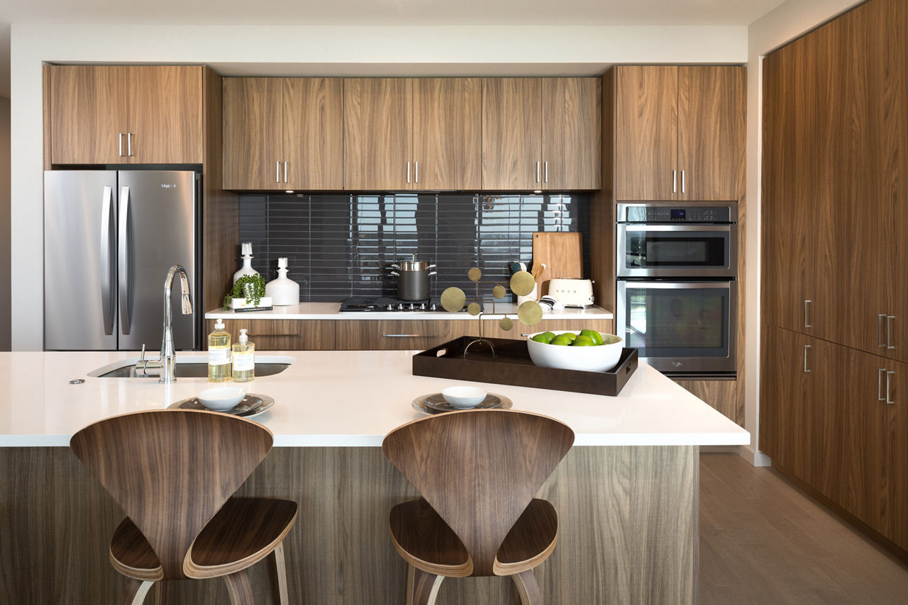 Modern kitchen with stainless steel appliances at The Kincaid at Legacy Apartments, luxury living in a stylish setting