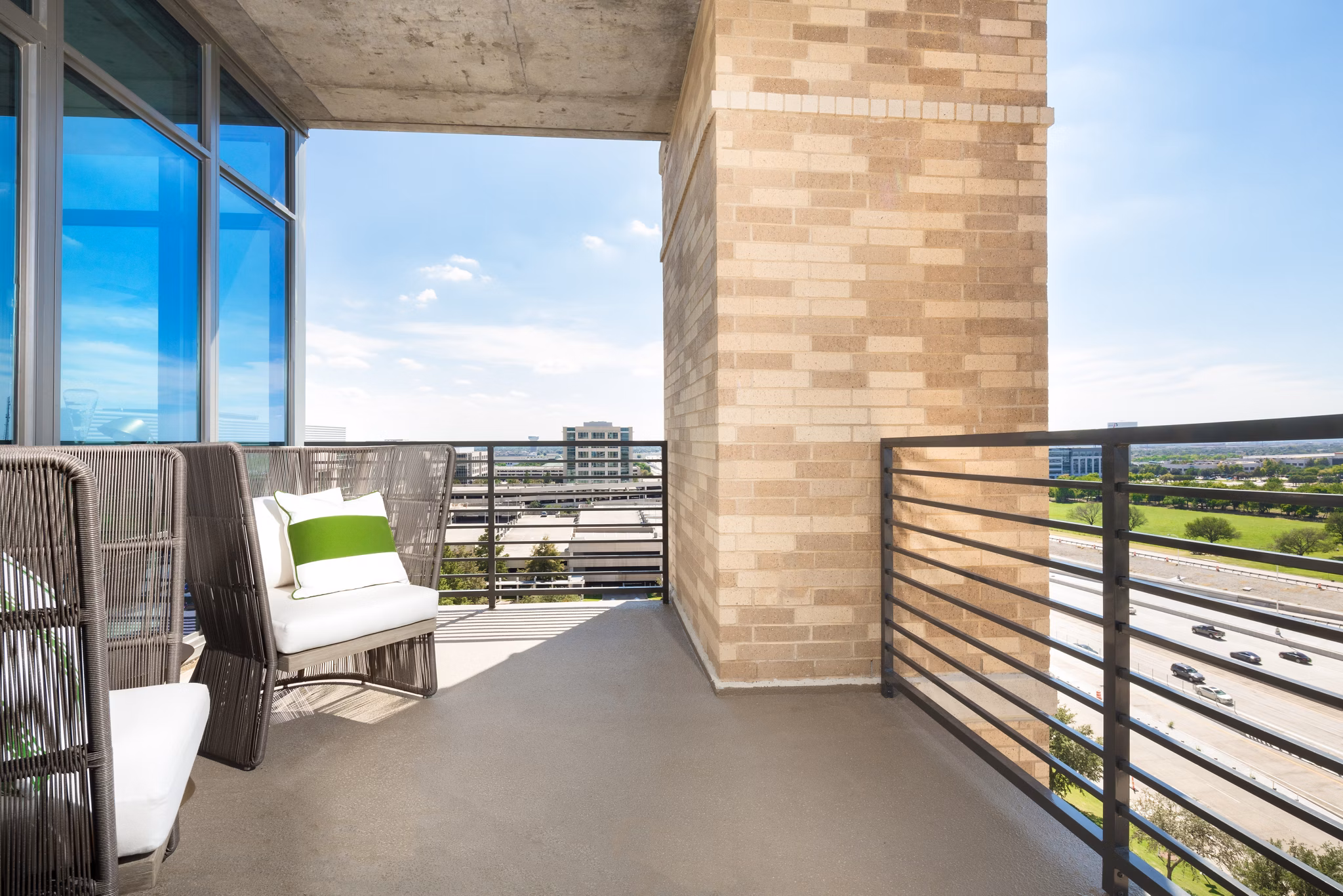 Inviting patio with modern furnishings at The Kincaid at Legacy Apartments, perfect for relaxation in a tranquil setting