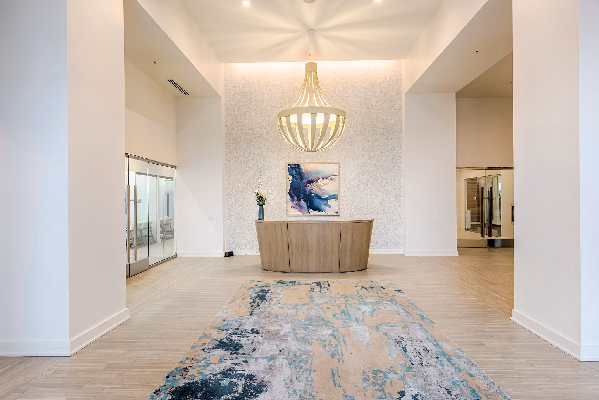 Chic clubhouse with modern furnishings at Nine15 Apartments, ideal for social gatherings and relaxation