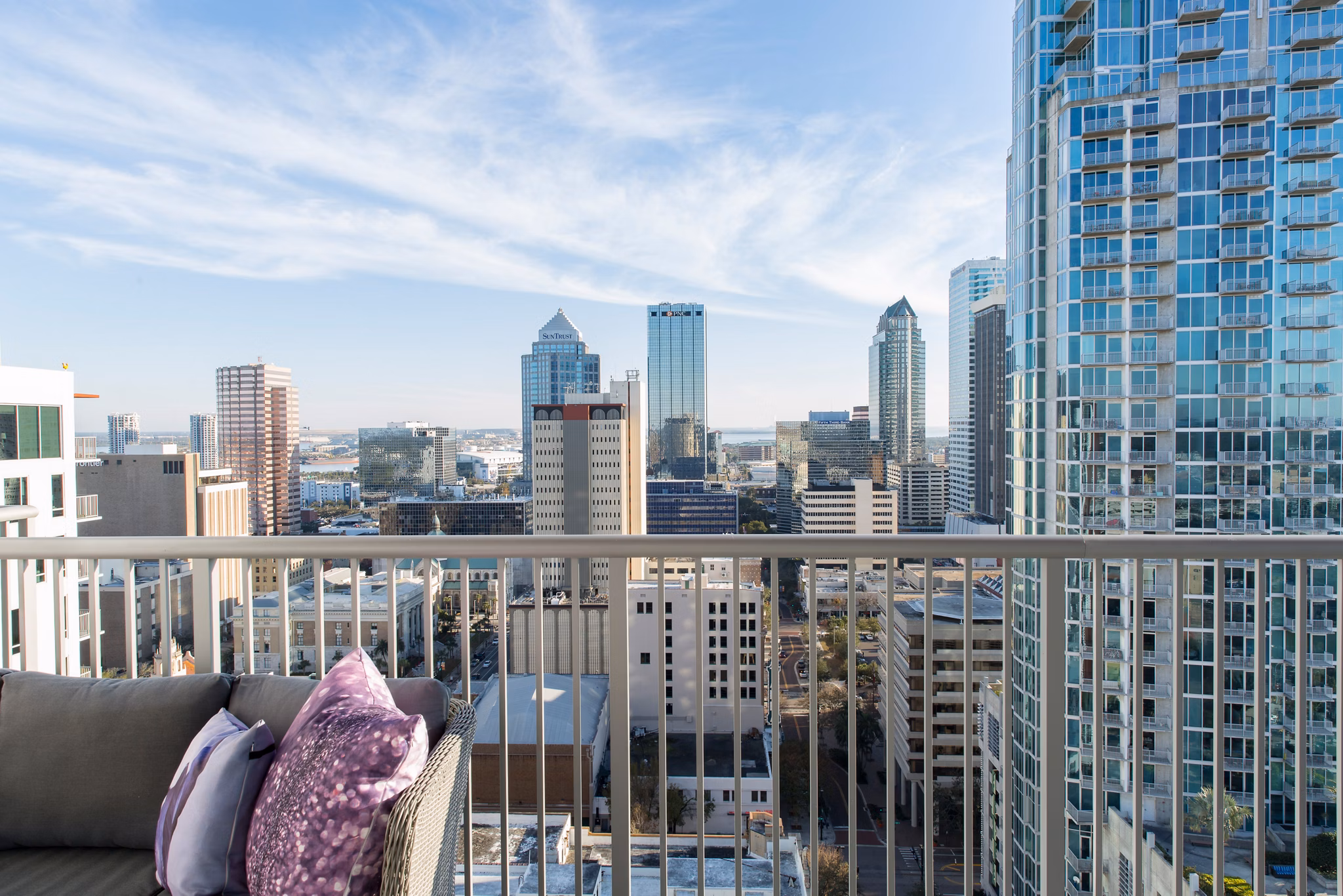 Nine15 Apartments: Urban skyline view from luxury high-rise balcony in downtown Los Angeles