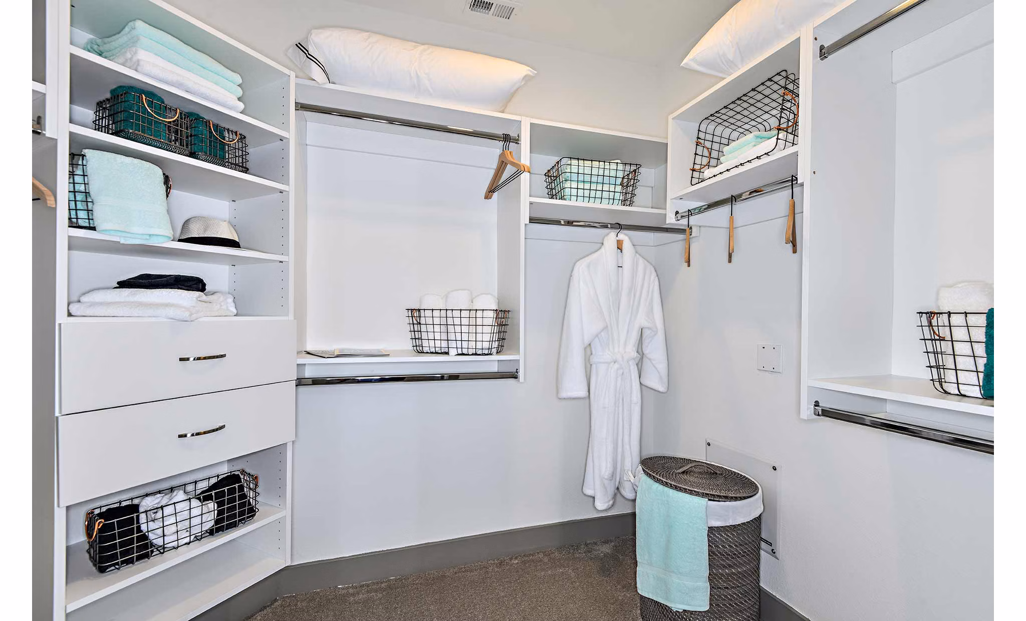 Walk-in closet with ample storage space at The Jamison Apartments