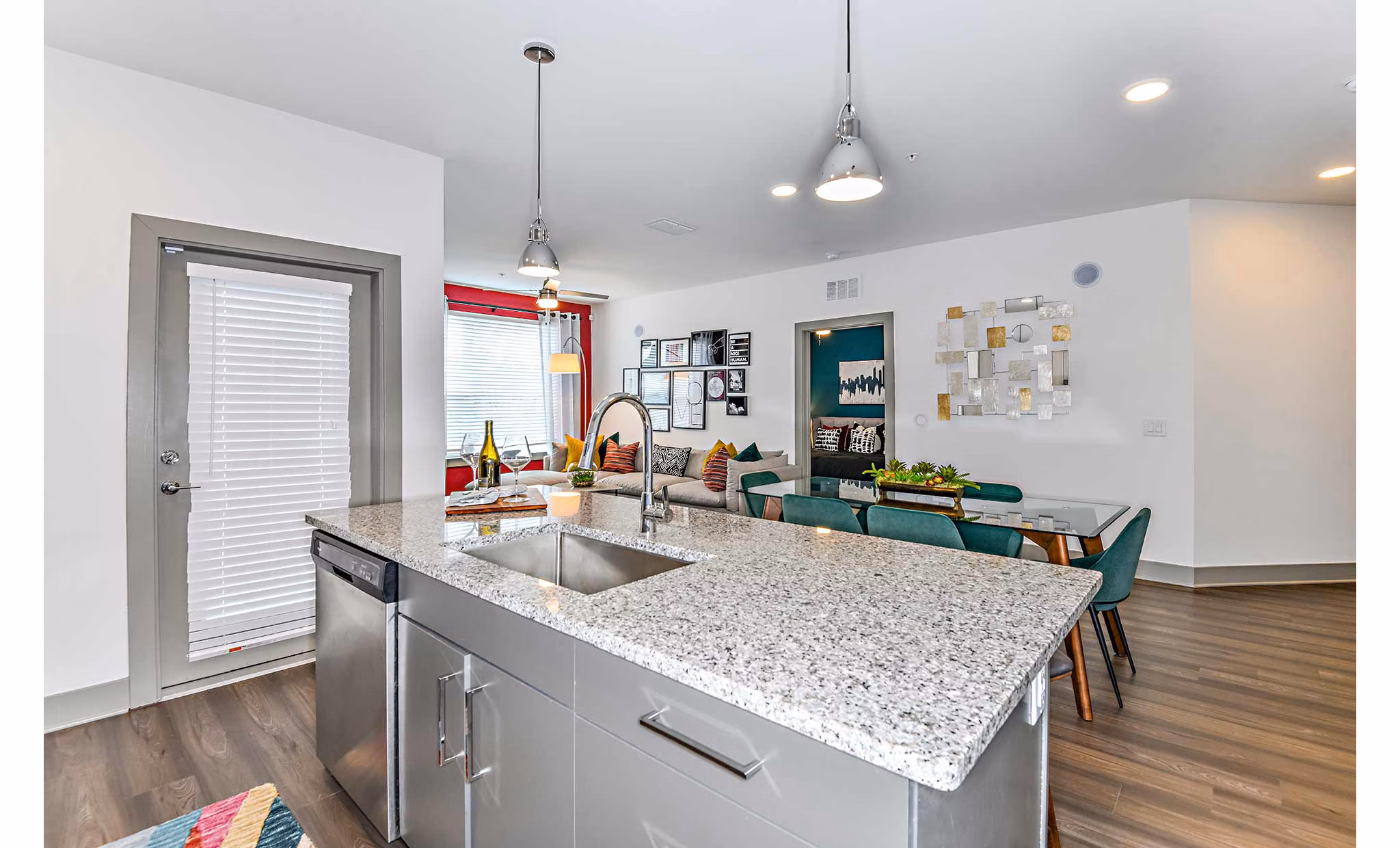 Modern kitchen with stainless steel appliances at The Jamison Apartments