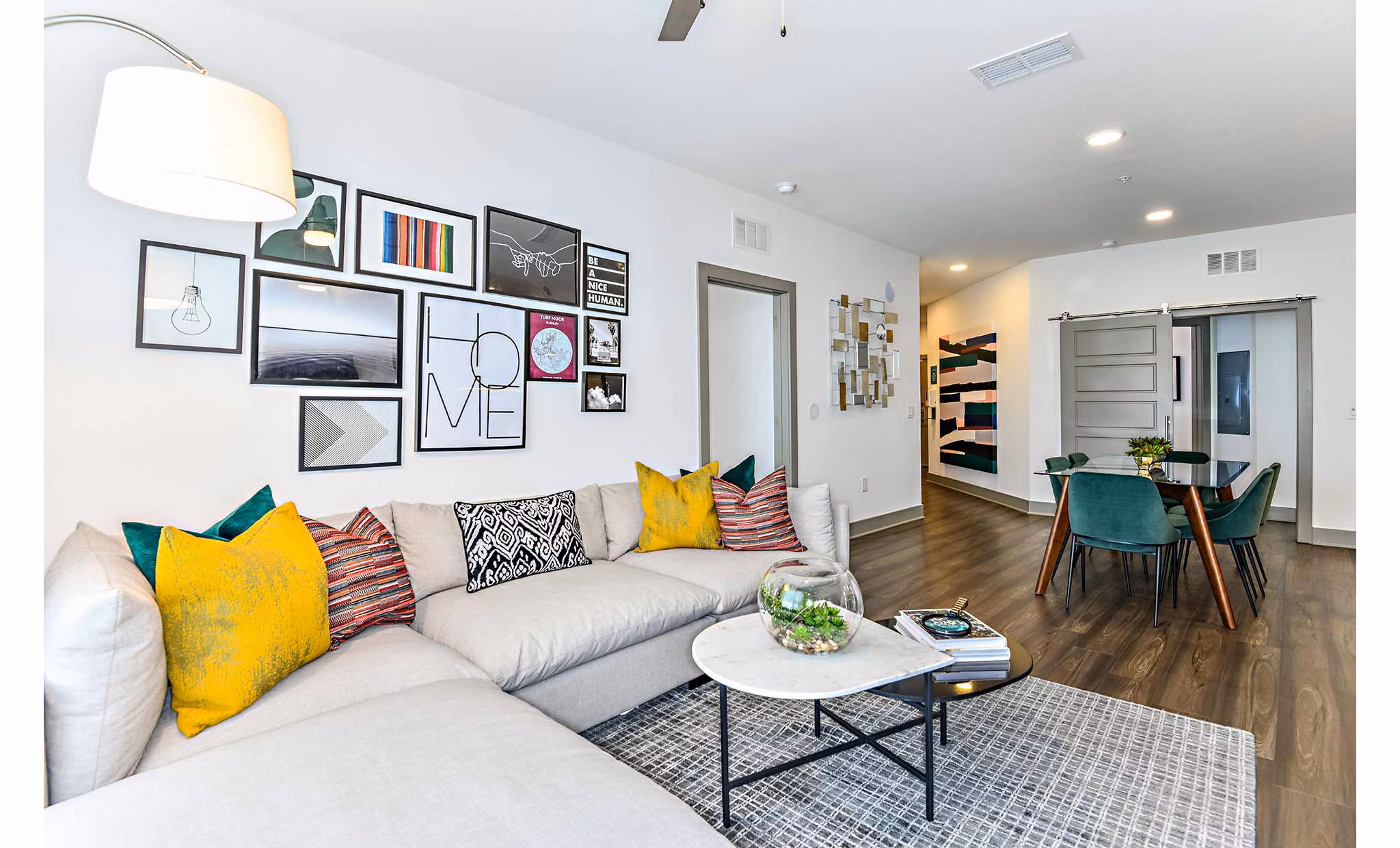 Spacious living room with contemporary decor at The Jamison Apartments