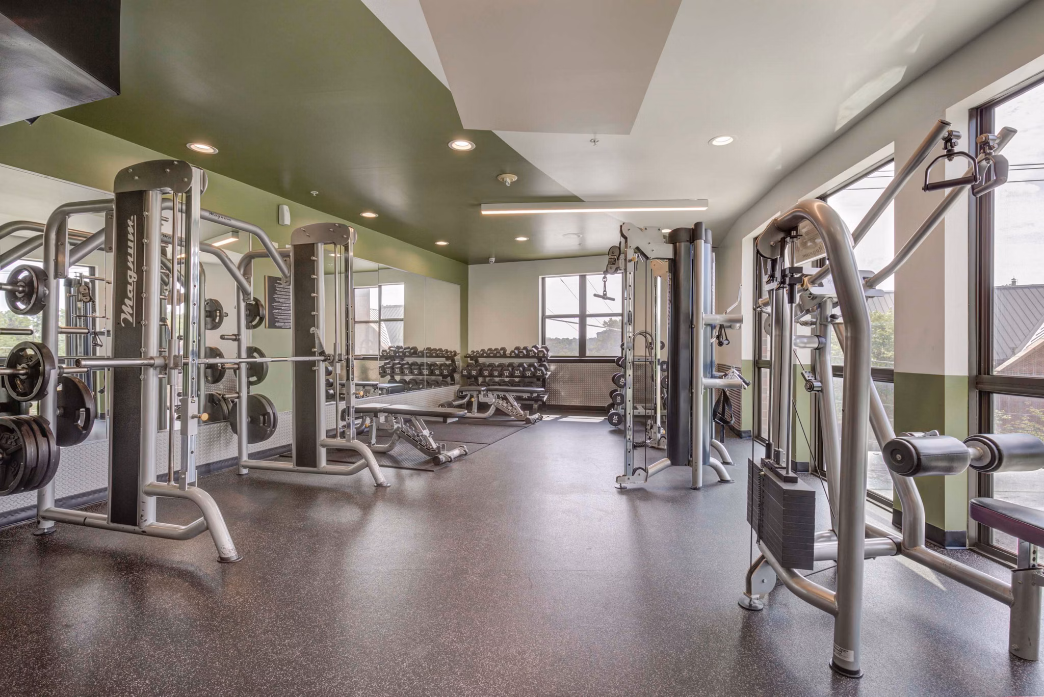 State-of-the-art fitness center at The Varsity Apartments, with modern equipment and spacious workout areas for all residents