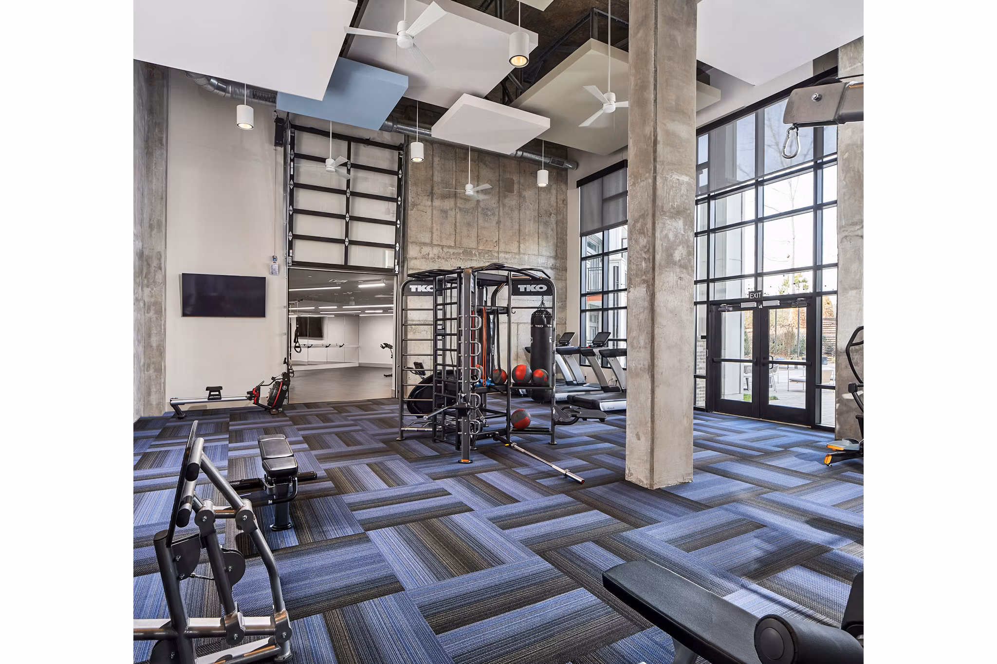 State-of-the-art fitness center at The Court at Redstone Apartments offering modern exercise equipment and spaces