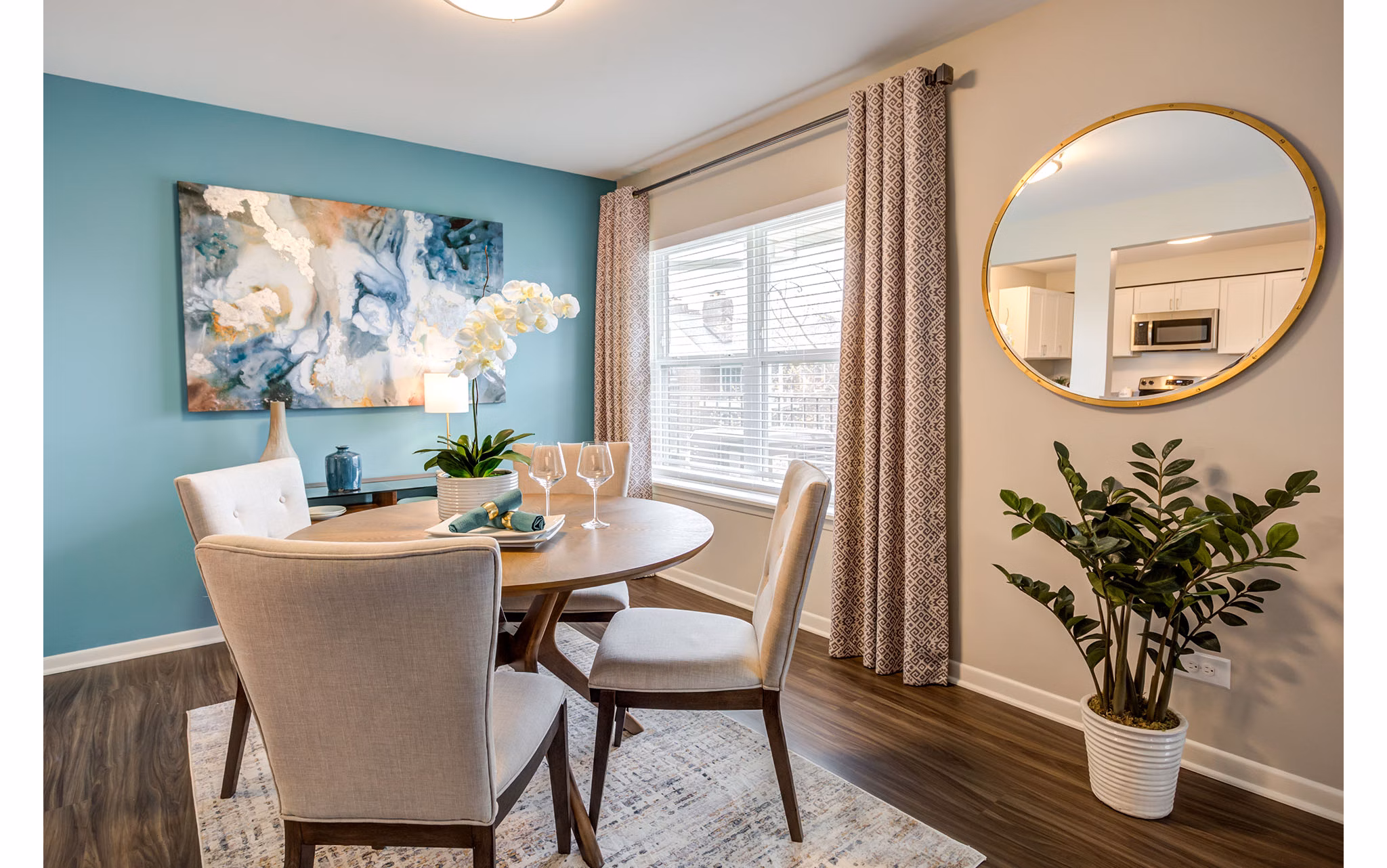 Dining area featuring sleek modern furnishings at Orion Arlington Lakes Apartments