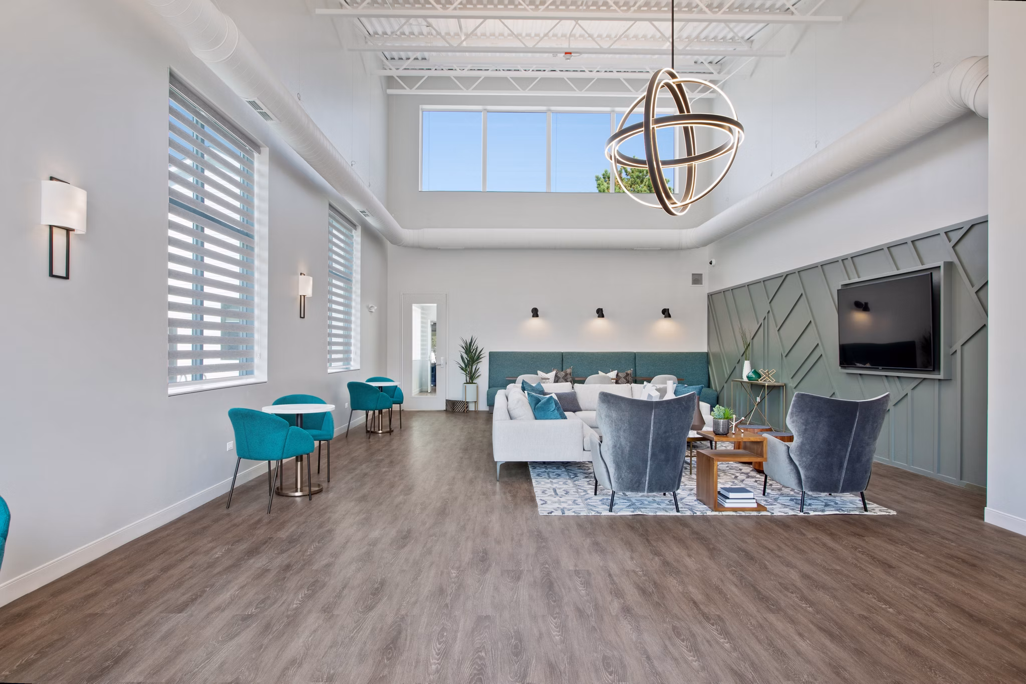 Modern clubhouse with stylish seating and decor at Orion Parkview Apartments, ideal for community gatherings and social events