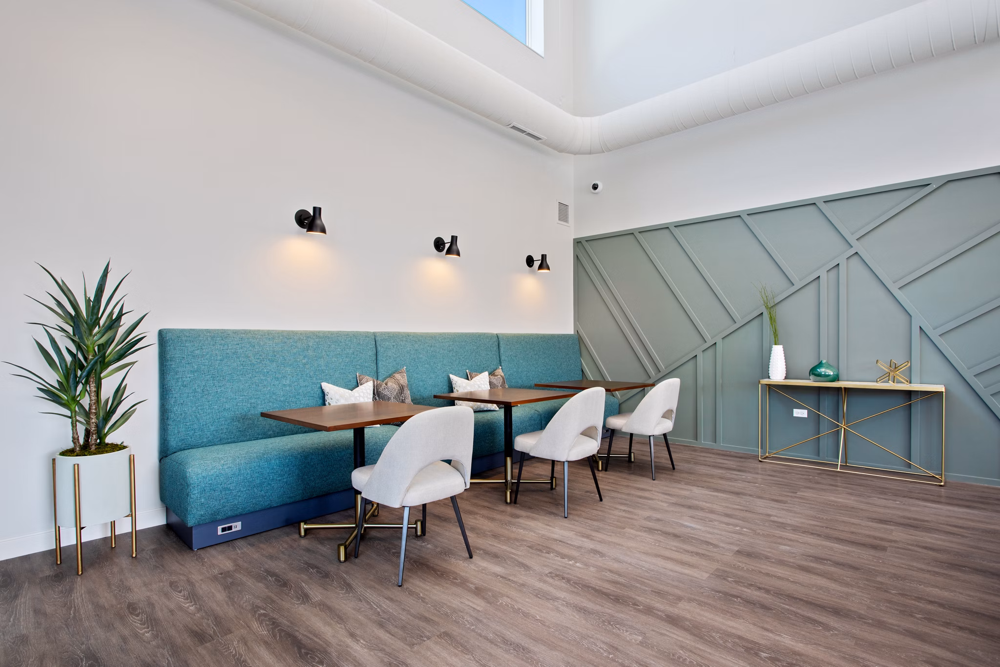 Clubhouse featuring modern design and seating areas at Orion Parkview Apartments