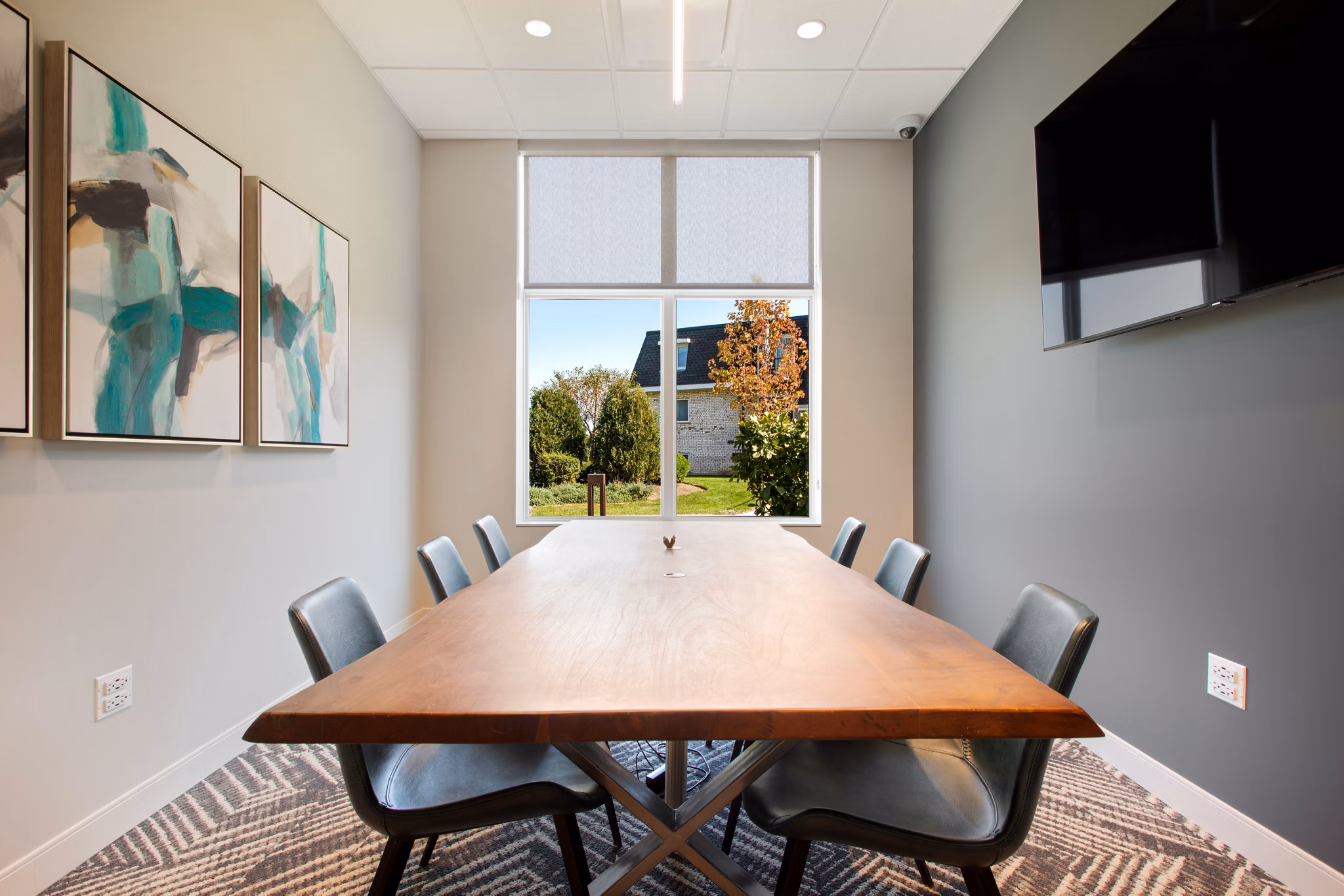 Meeting room equipped with modern facilities at Orion Parkview Apartments, ideal for business gatherings and conferences