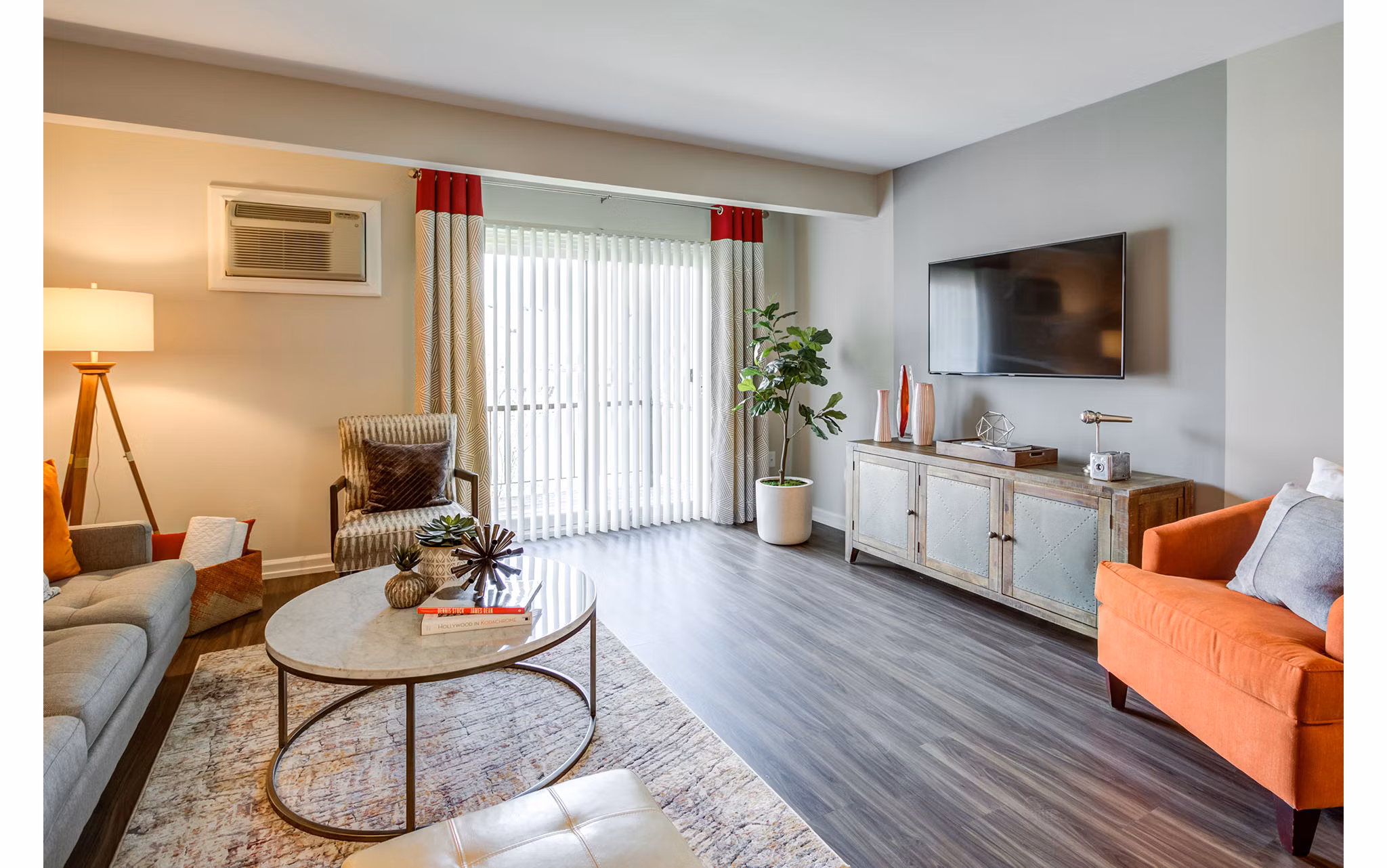 Spacious living room with stylish furnishings and natural light in Orion Parkview Apartments