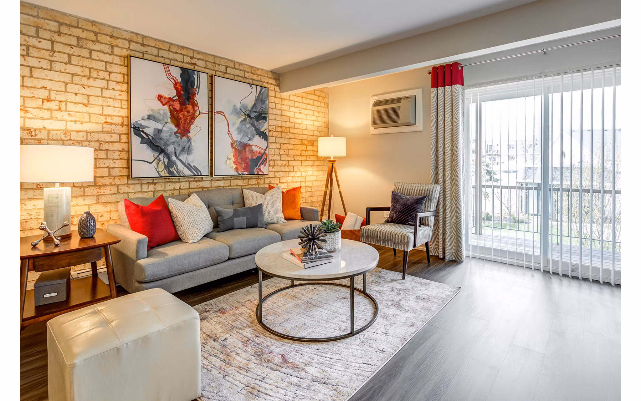 Spacious living room with modern furniture at Orion Parkview Apartments