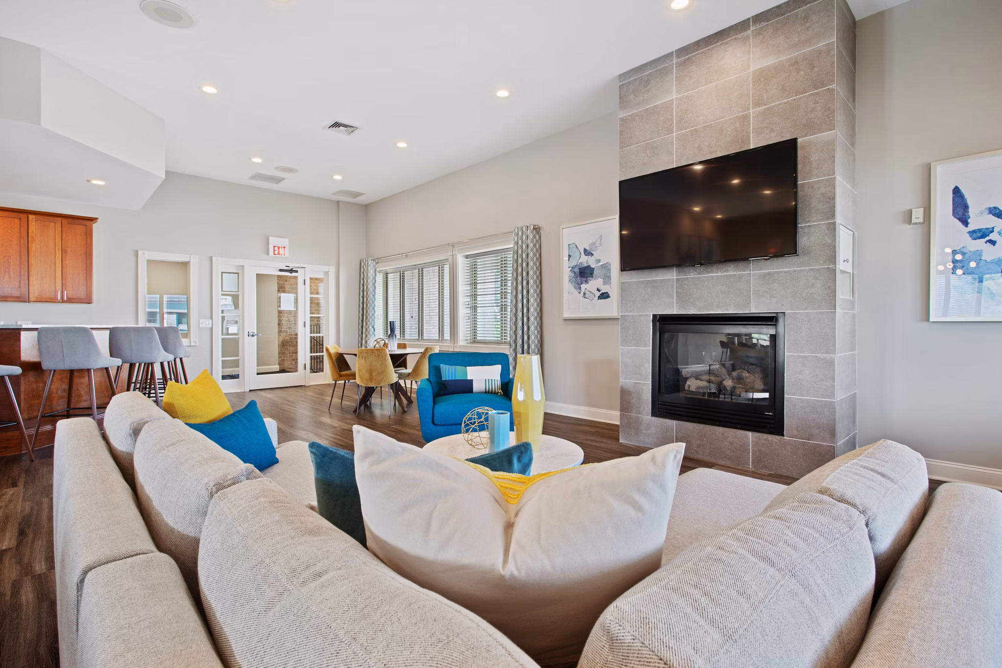 Elegant clubhouse with modern furnishings at Orion Prospect Apartments, ideal for gatherings and events in a luxury setting