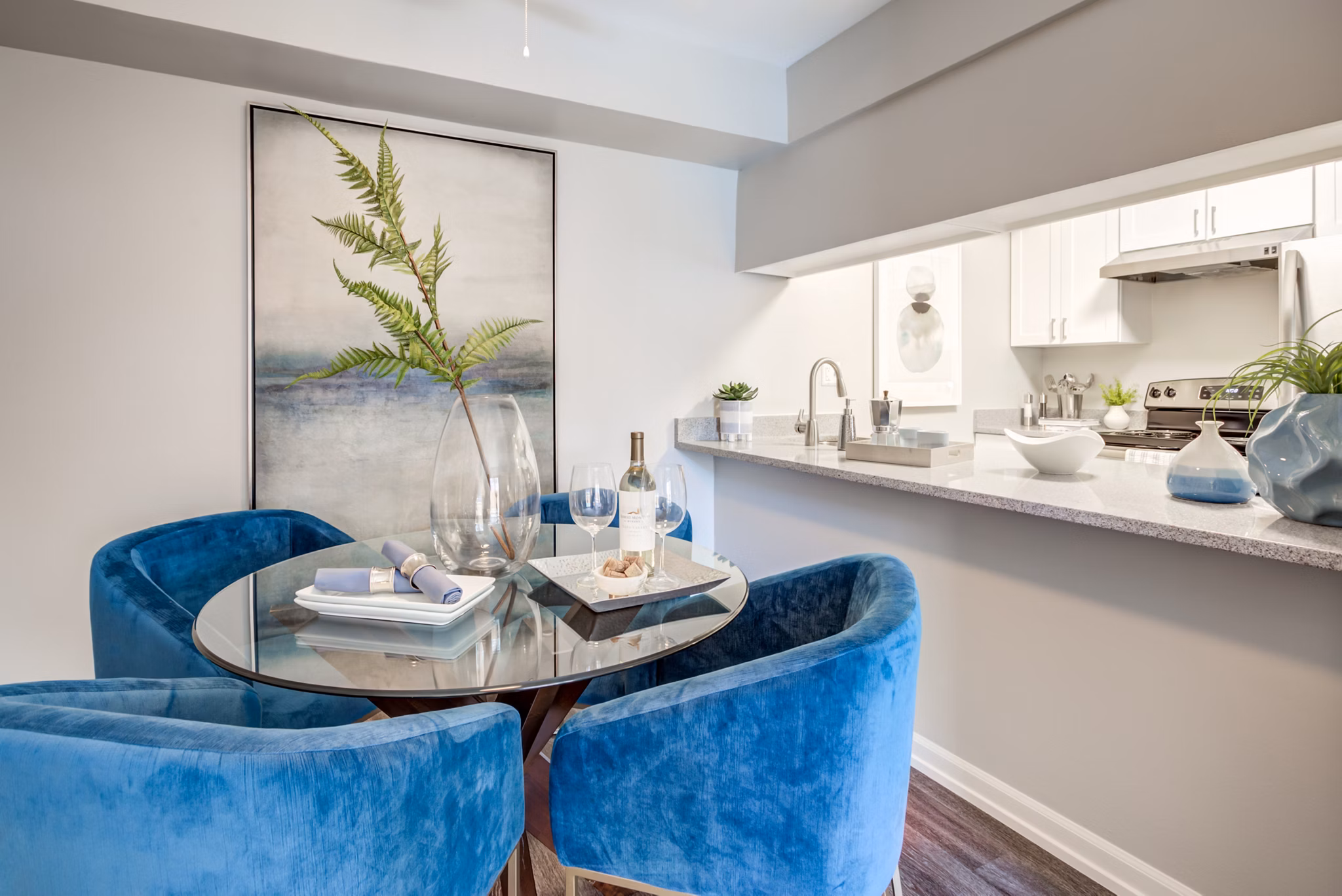 Dining area with modern furniture and stylish lighting at Orion Prospect Apartments Luxury living in a refined setting