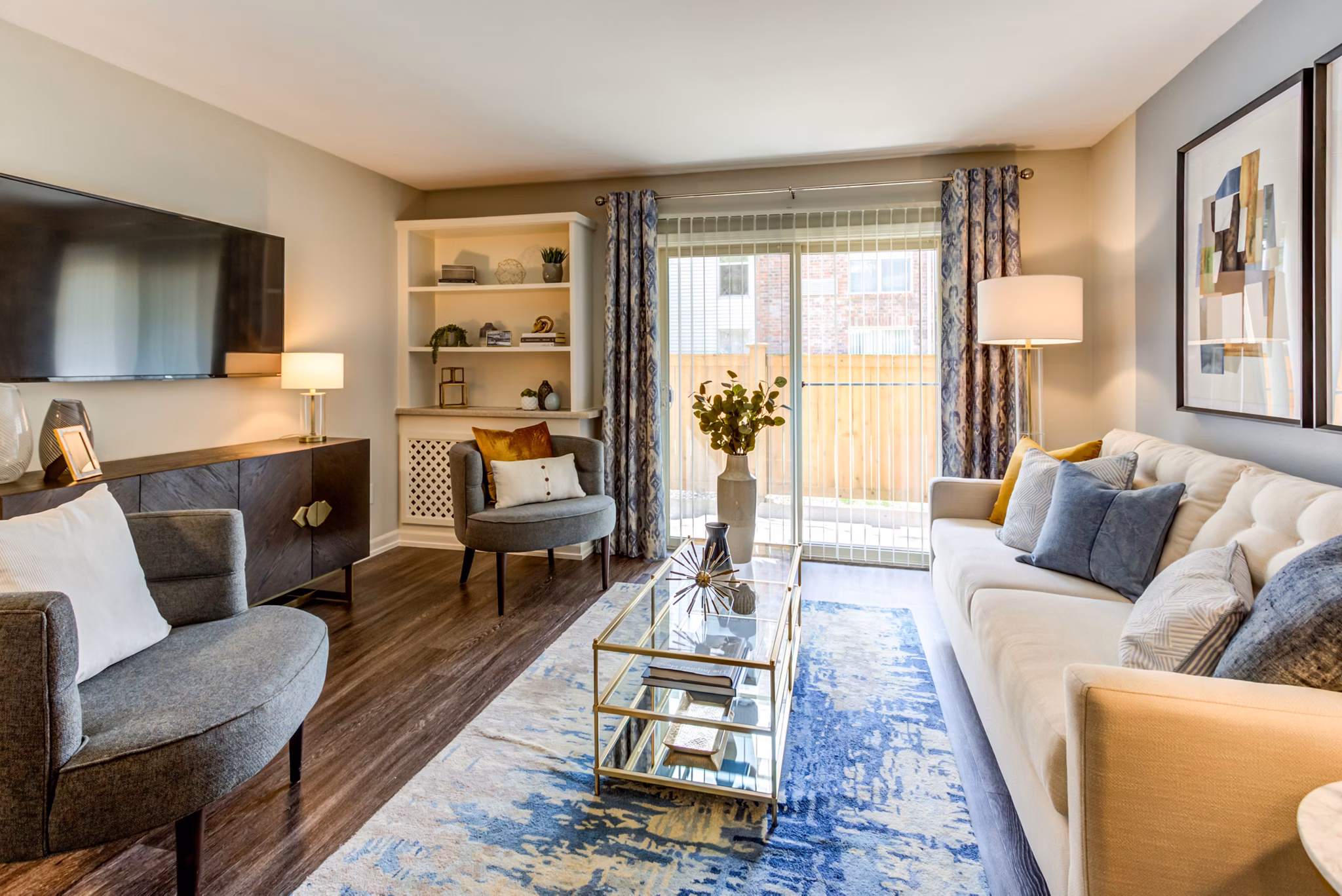 Spacious living room with modern decor at Orion Prospect Apartments