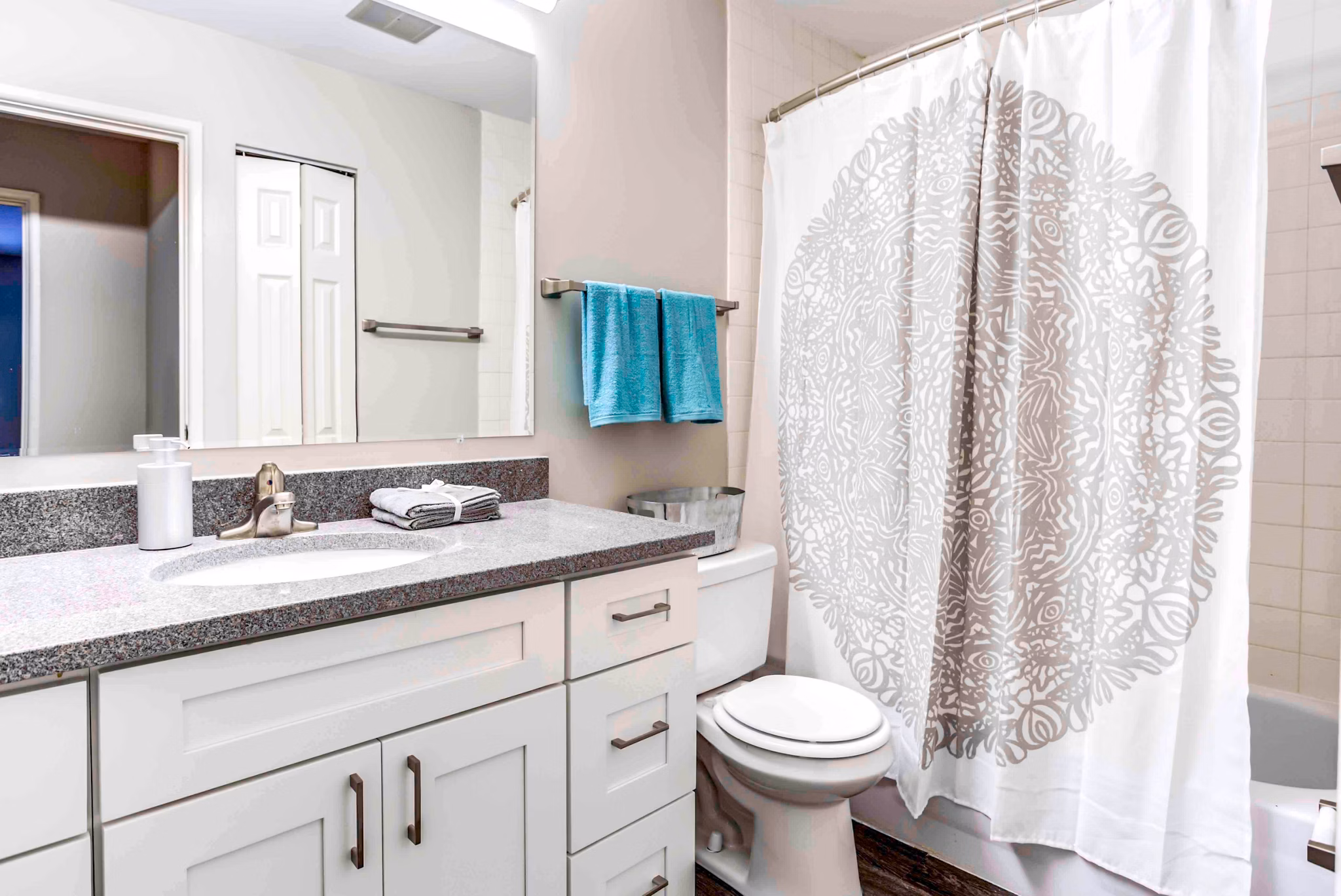 Modern bathroom with sleek fixtures at Orion 59 Apartments, offering luxury living in a contemporary design