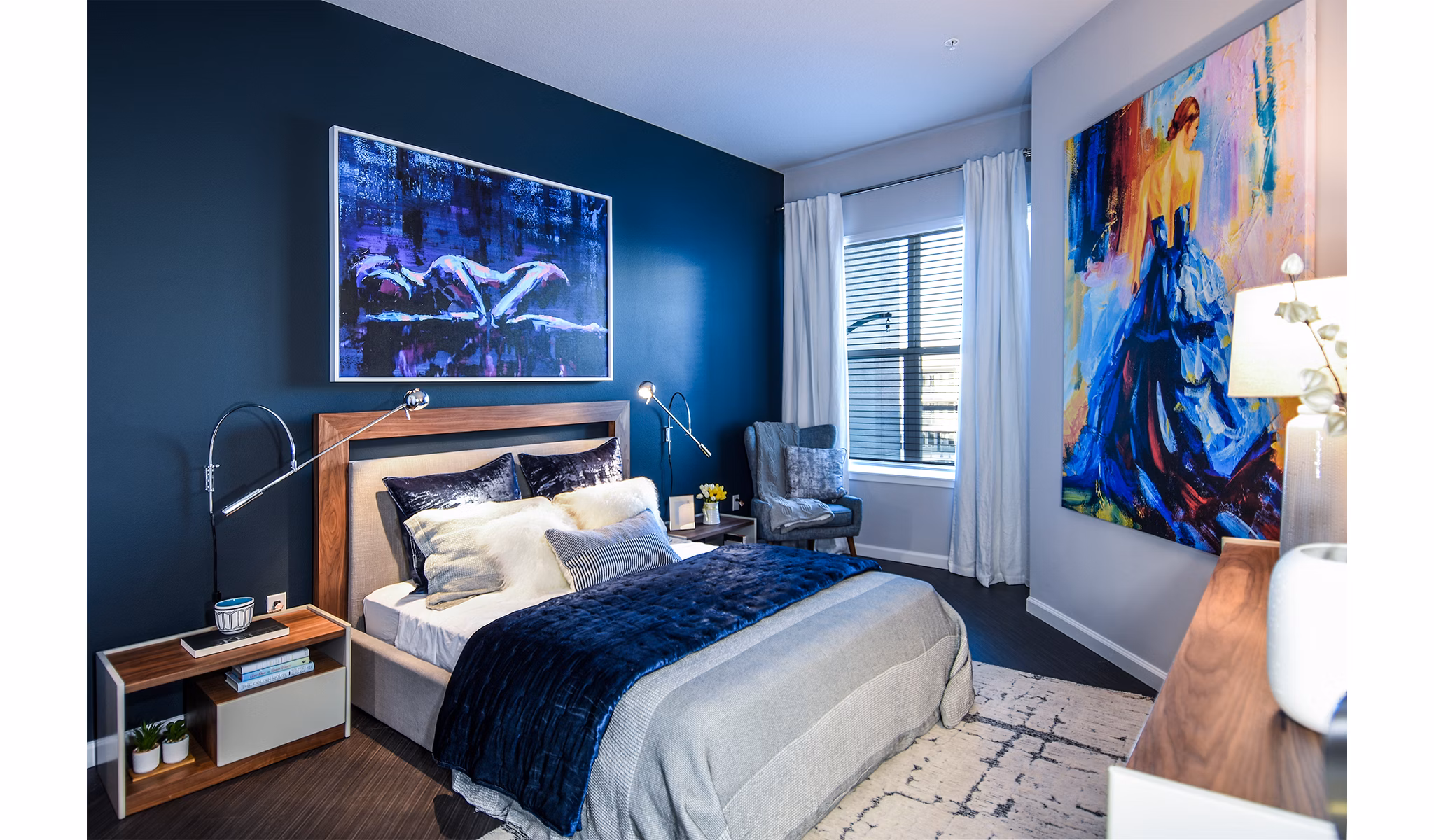 Cozy bedroom with plush bedding at Sanctuary at Centerpointe Apartments