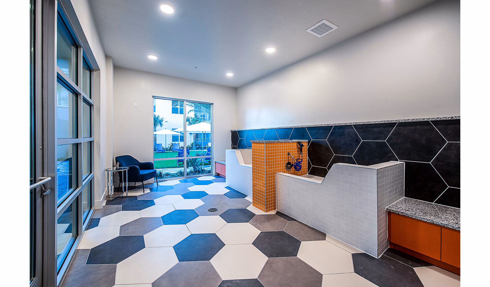 Dog wash station at Sanctuary at Centerpointe Apartments featuring modern pet-friendly amenities