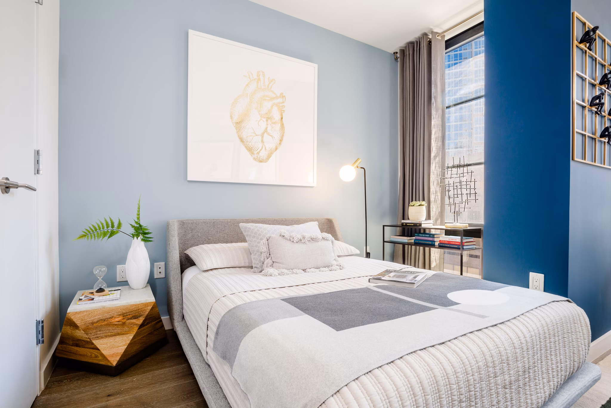 Cozy bedroom with modern decor at 1 Flatbush Apartments featuring luxury amenities