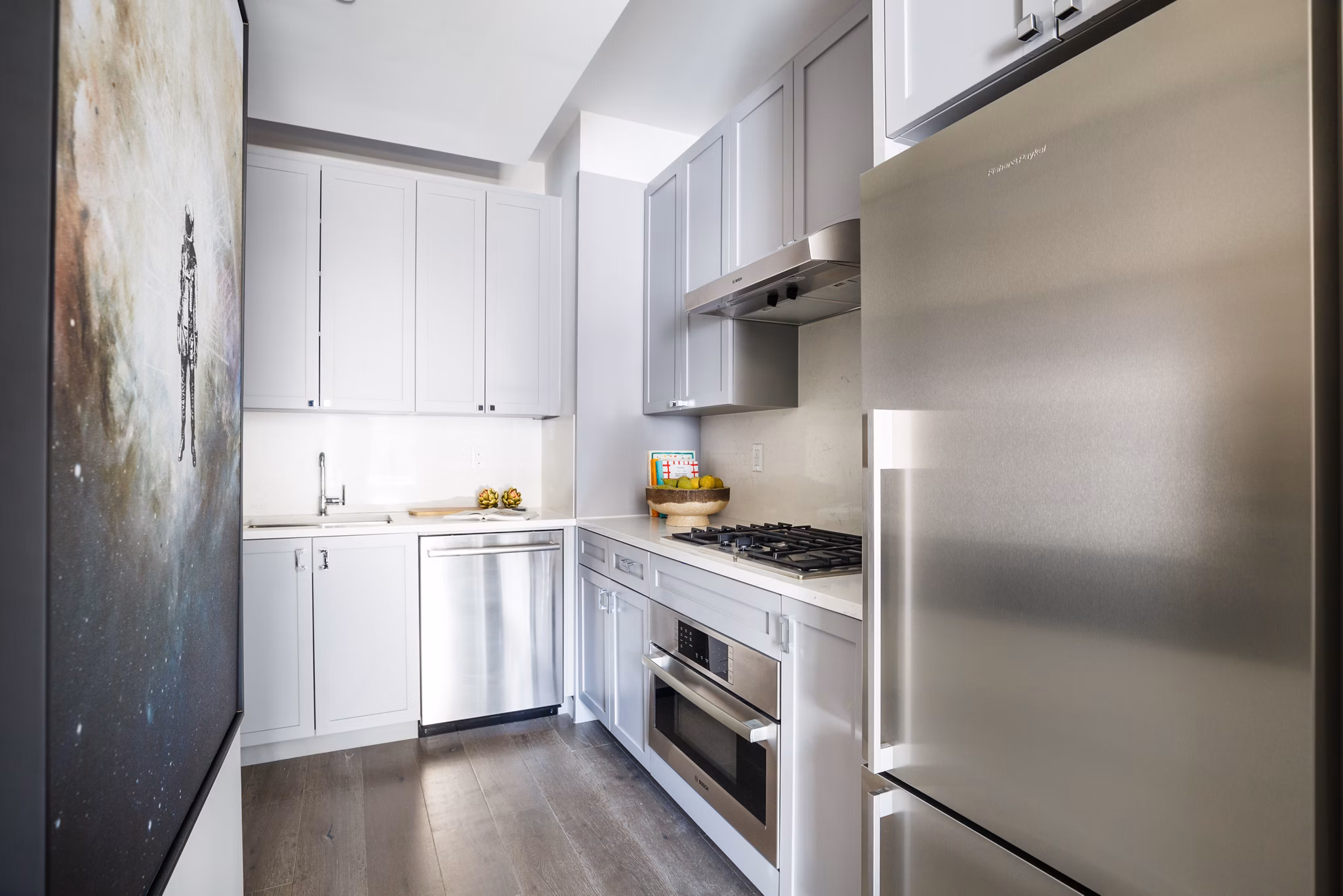 Modern kitchen with stainless steel appliances at 1 Flatbush Apartments