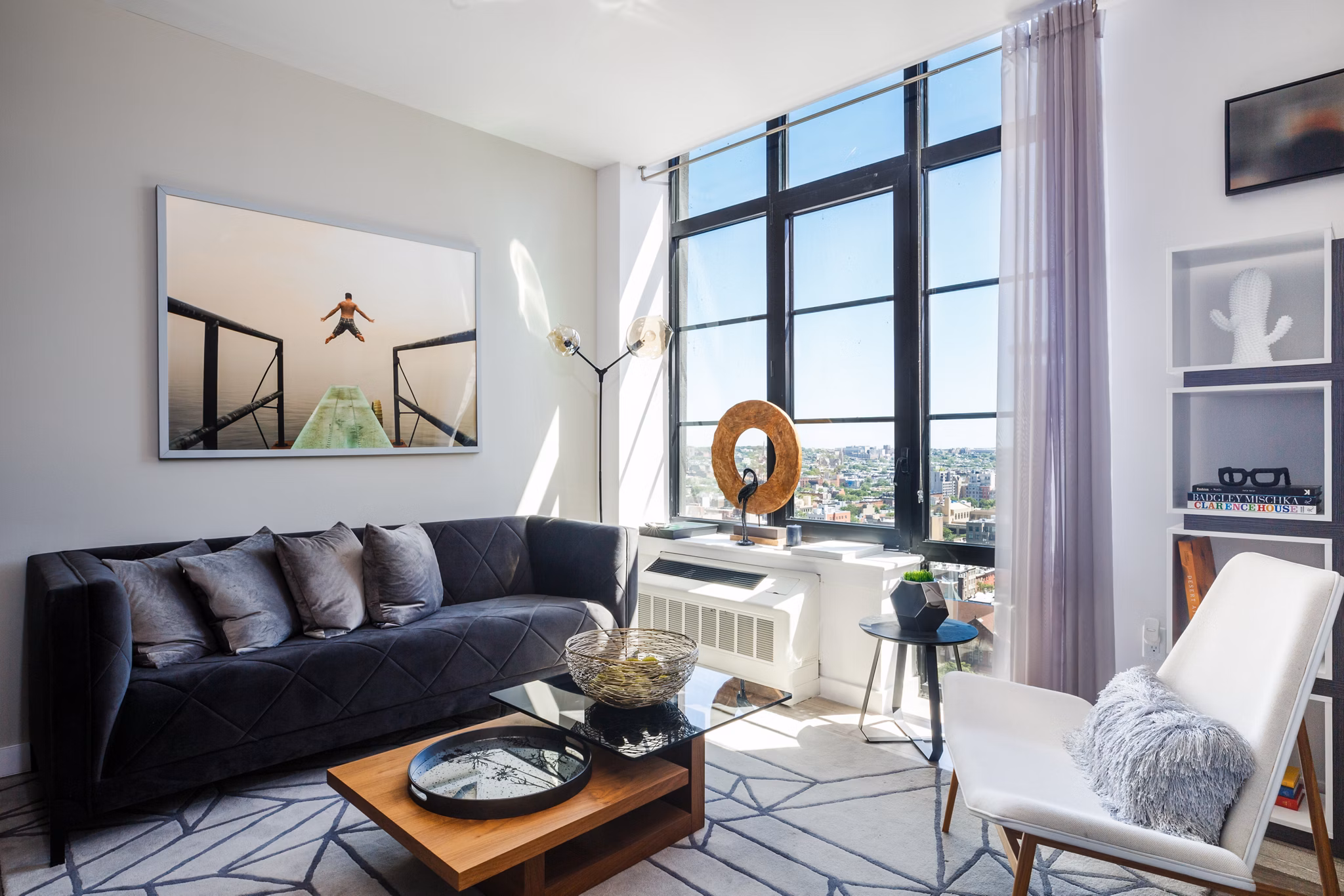 Spacious living room with modern decor in 1 Flatbush Apartments, featuring luxury amenities and style