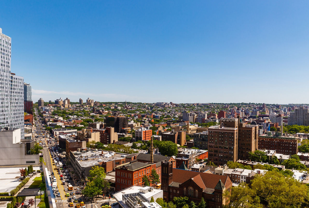 View of 1 Flatbush Apartments: Modern luxury high-rise with panoramic city views in vibrant downtown Brooklyn