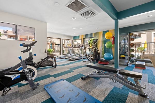 fitness center at The Bella Apartments