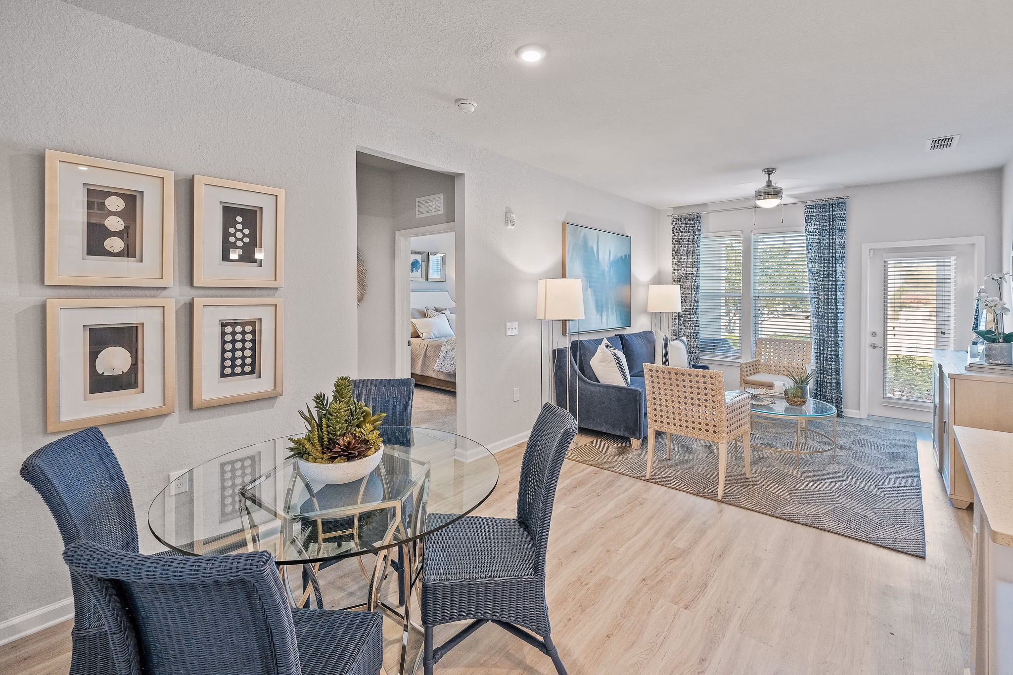 Dining area featuring modern decor and large windows at Vue at Belleair Apartments