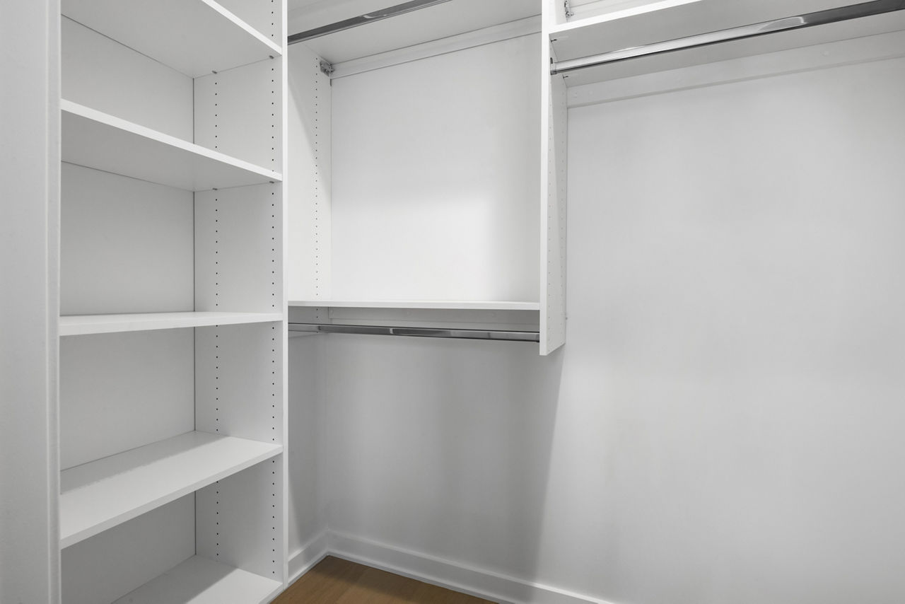 Walk-in closet with ample shelving in 360 Huguenot Apartments, a feature of Greystar luxury apartments