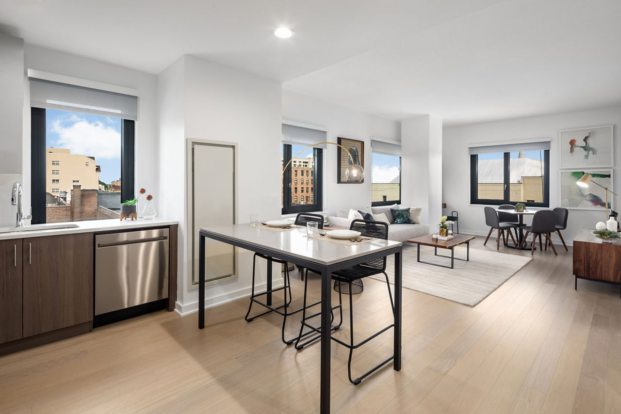 Dining area with modern furnishings featuring sleek design at 360 Huguenot Apartments