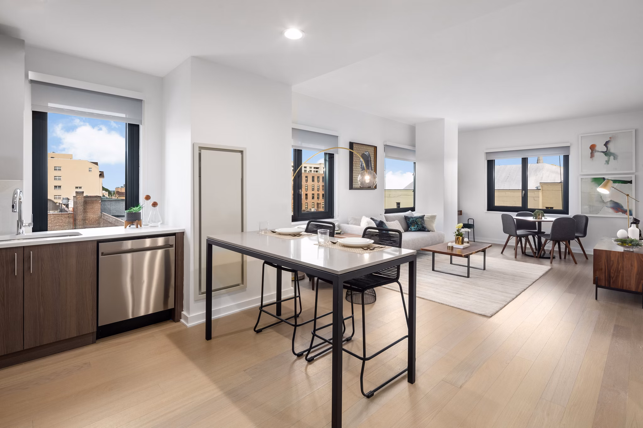 Dining area with modern furnishings featuring sleek design at 360 Huguenot Apartments
