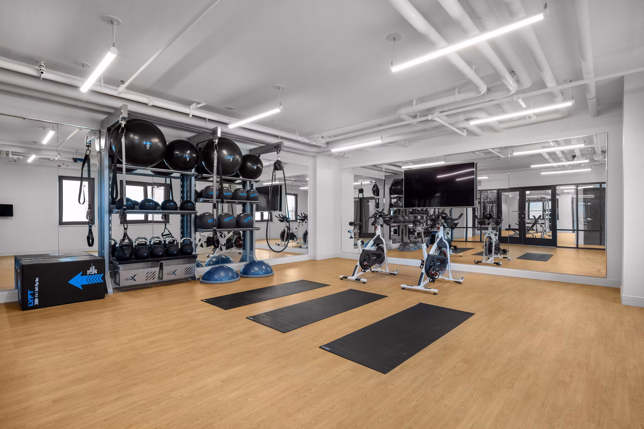 Modern fitness center with state-of-the-art equipment at 360 Huguenot Apartments