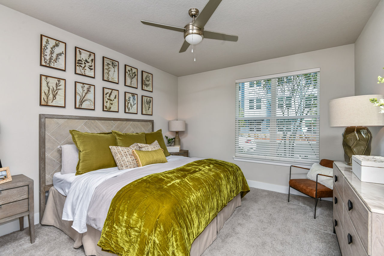 Cozy bedroom with modern decor at The Lodge at Hamlin Apartments