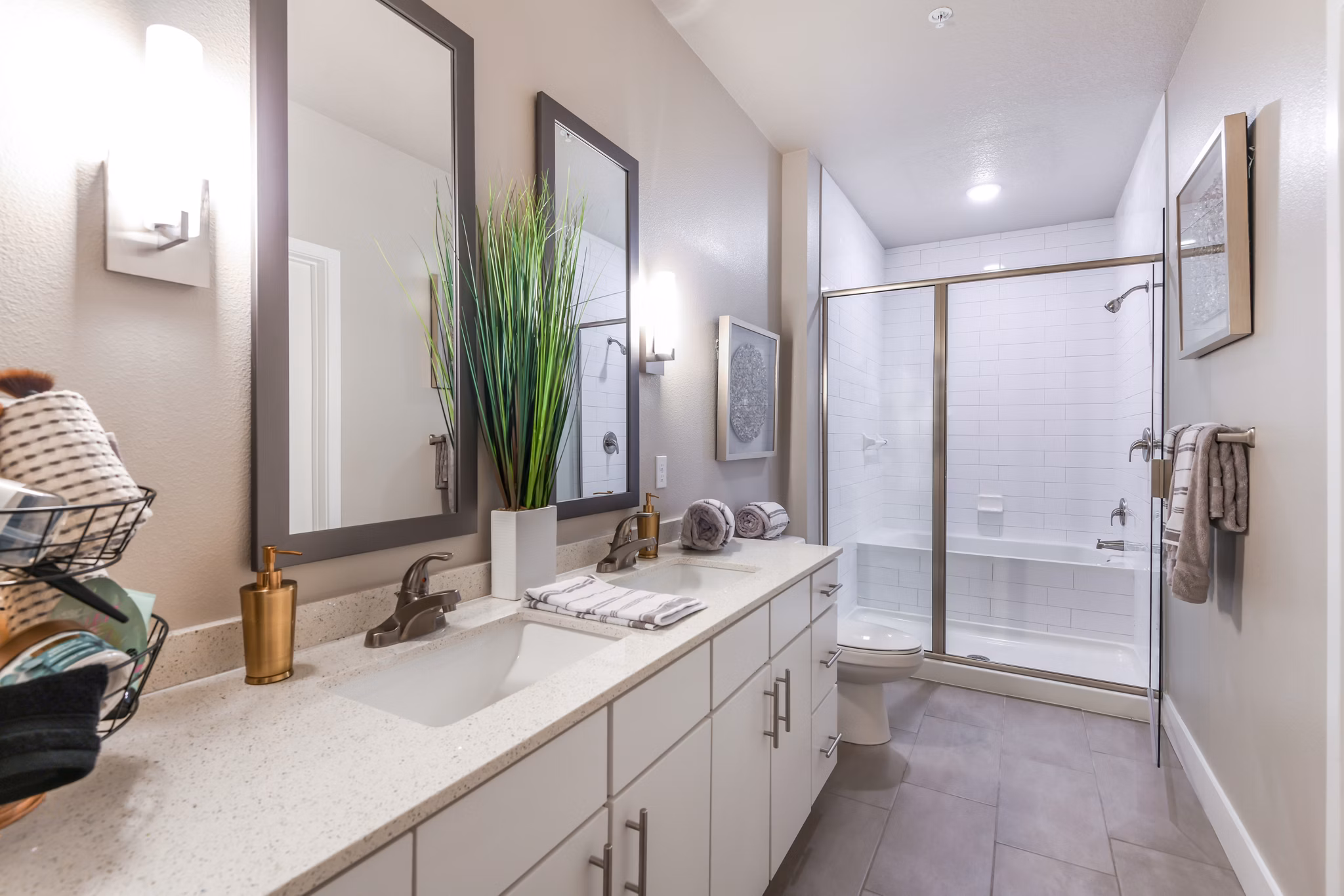 Modern bathroom with sleek fixtures at The Lodge at Hamlin Apartments