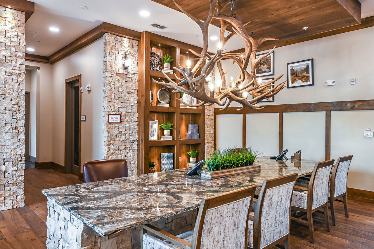 Clubhouse with modern design and communal seating at The Lodge at Hamlin Apartments