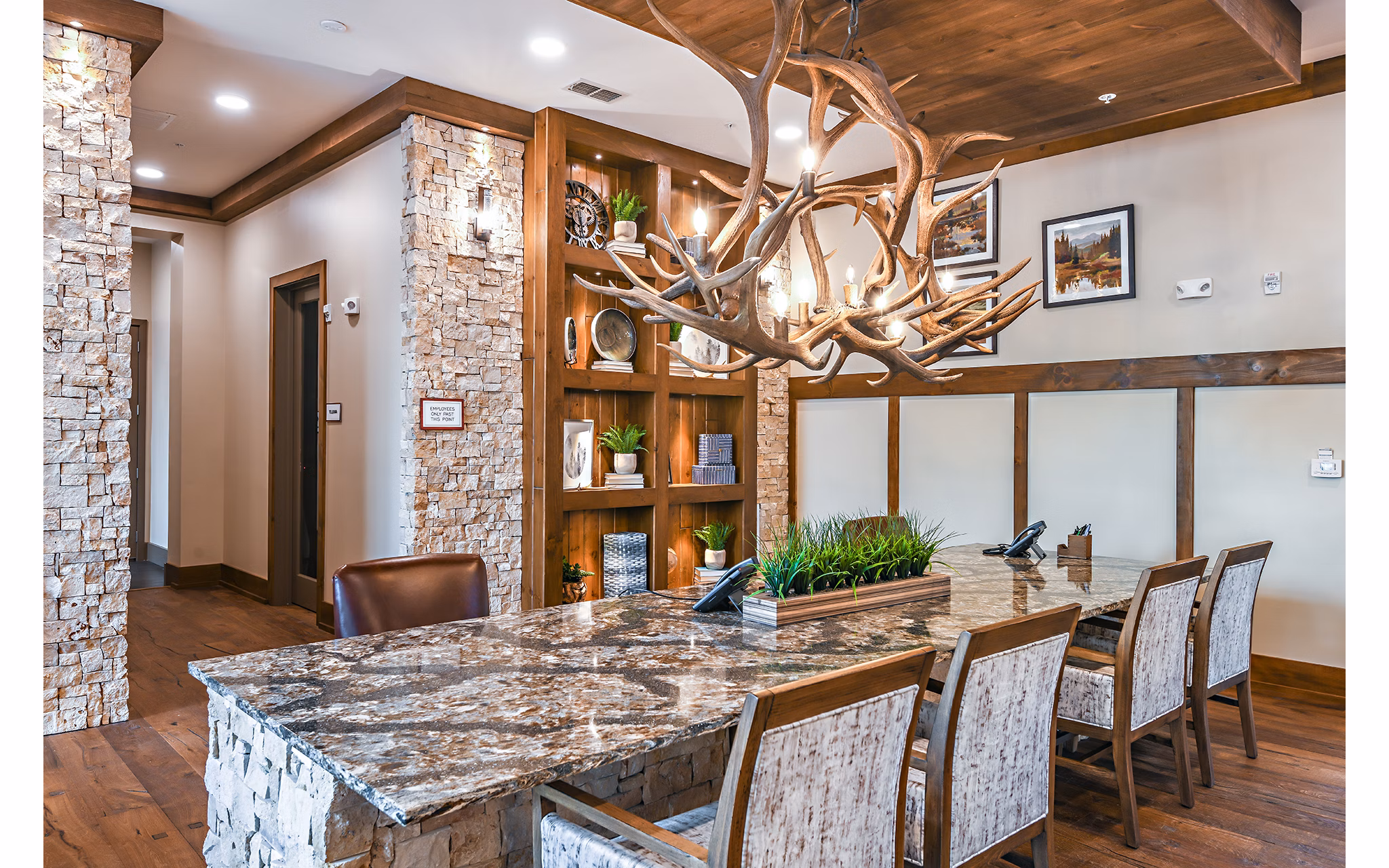Clubhouse with modern design and communal seating at The Lodge at Hamlin Apartments